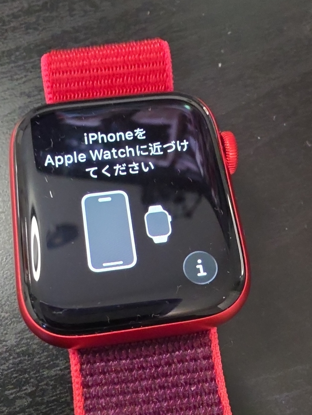 Apple Smartwatch with Red Case and Red/Purple Nylon Band